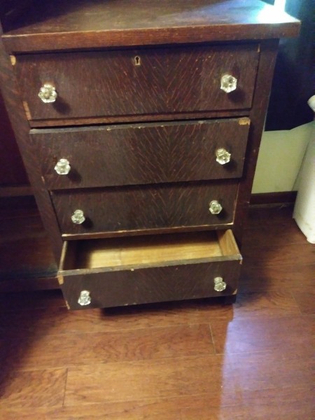 An open drawer of the wardrobe.