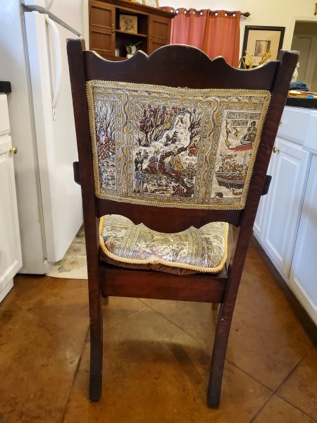 The back of a decorative chair.