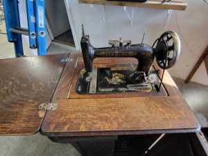 An old fashioned sewing machine.