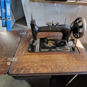 An old fashioned sewing machine.