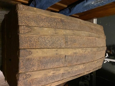 The top of a steamer trunk.