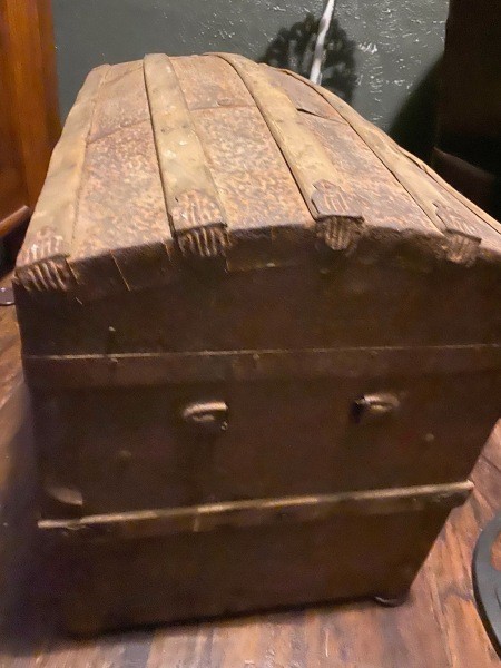 The end of a steamer trunk.