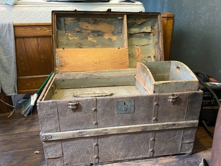 the open steamer trunk.