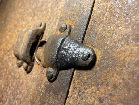 Hardware on a steamer trunk.
