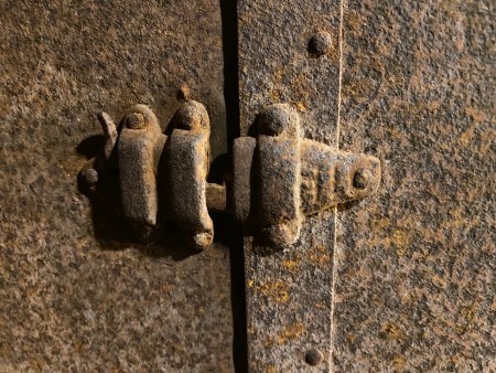 Hardware on a steamer trunk.