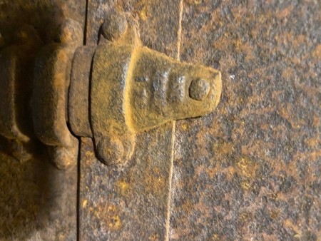 Hardware on a steamer trunk.