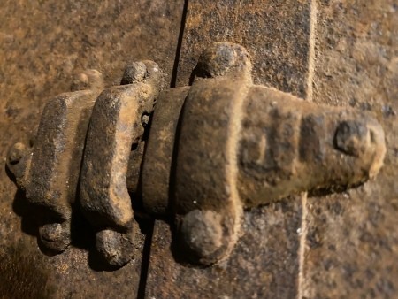 Hardware on a steamer trunk.