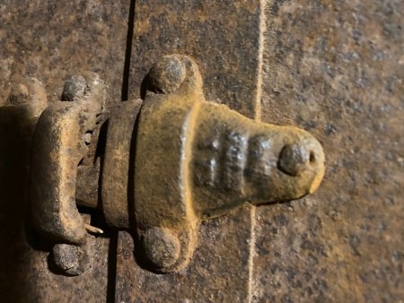 Hardware on a steamer trunk.