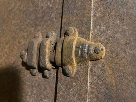 Hardware on a steamer trunk.