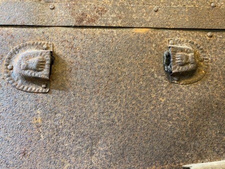 Hardware on a steamer trunk.