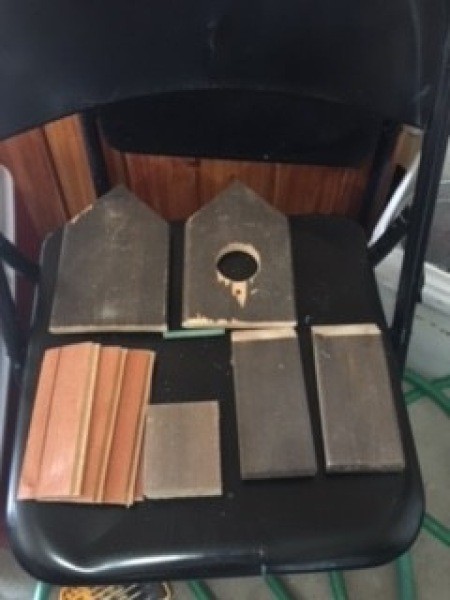 Assembling the parts of the birdhouse.