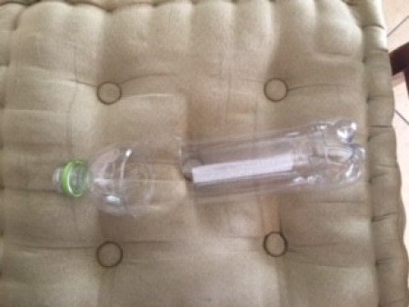 Attaching the bottle pieces back together.