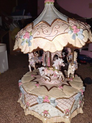 A decorative carousel music box.