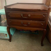 A small wooden end table.