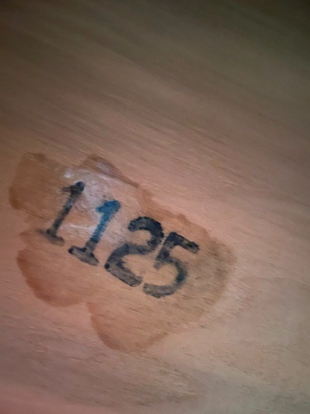 A number on a piece of furniture.