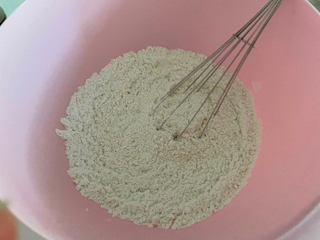 Mixing the dry bread ingredients.