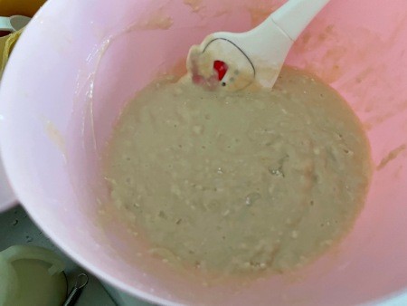 The bread dough in a bowl.