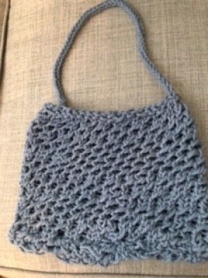 The completed loom knit bag.