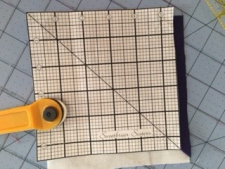 Cutting out the fabric.