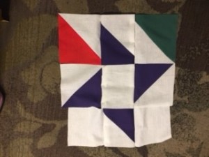 A pinwheel quilt square.