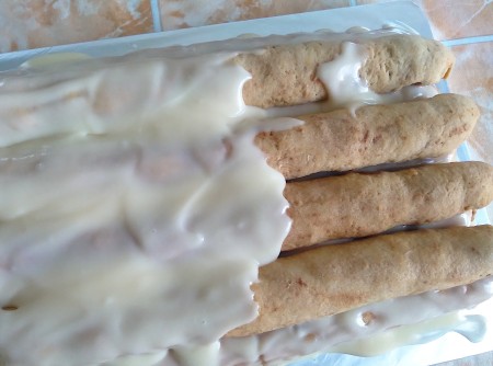 Covering the tubes with cream.