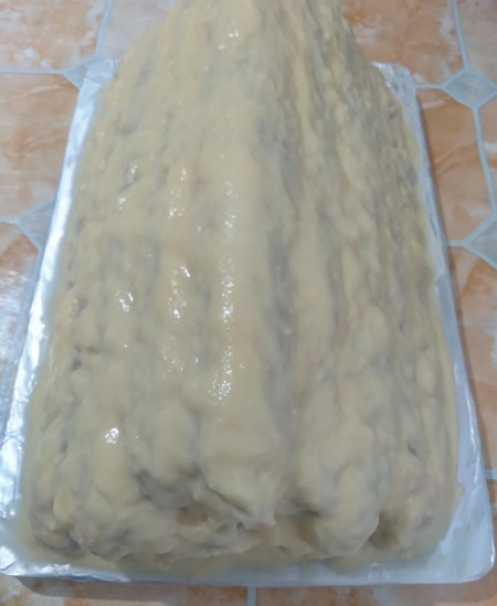 The cake covered in cream.