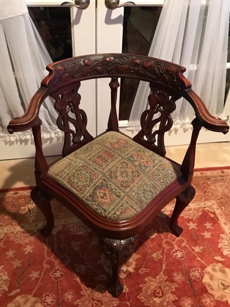An antique corner chair.