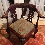 An antique corner chair.
