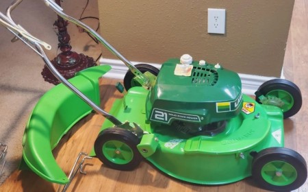 A green lawn mower.