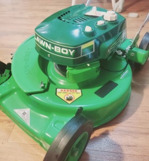 A green lawn mower.