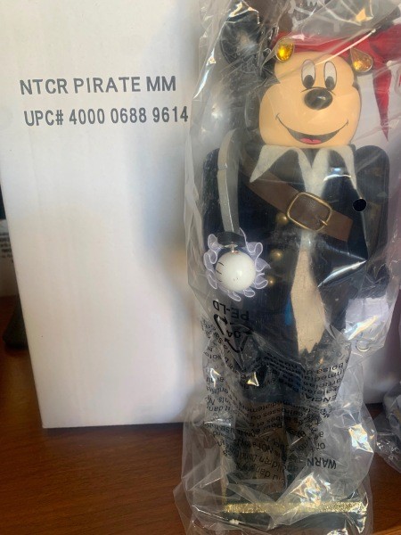 A pirate Mickey Mouse figurine.