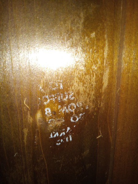 The marking on the back of the wardrobe.