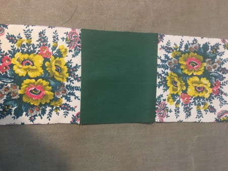 Three squares sewn together.