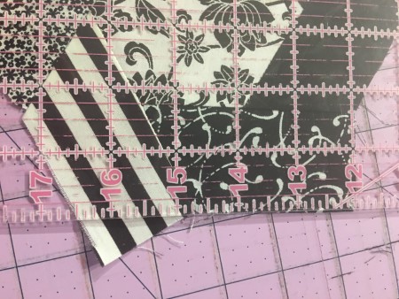 Cutting off the edges.