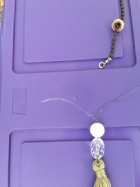 Adding beads to the pull.