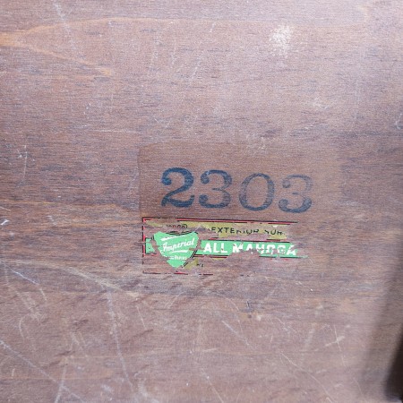 Number and manufacture's marking on the underside of a table.