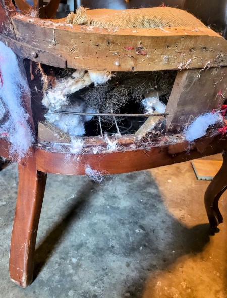 Side view of wooden chair.