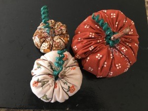 Three finished stuffed pumpkins.