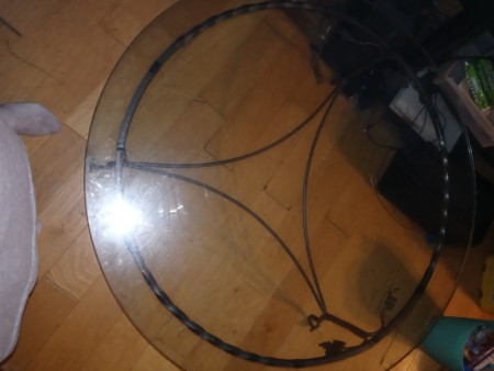 A top view of a glass topped table.