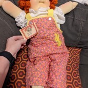 A Cabbage Patch doll with red hair.