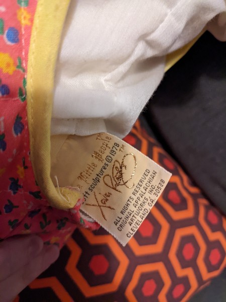 The tag on a Cabbage Patch doll.