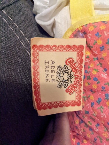 The name tag on a Cabbage Patch doll.
