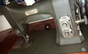 A vintage White sewing machine.