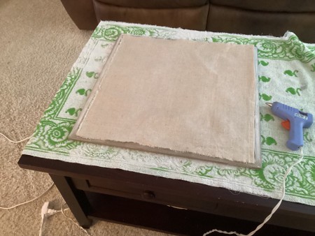 Glueing the back of the tile.