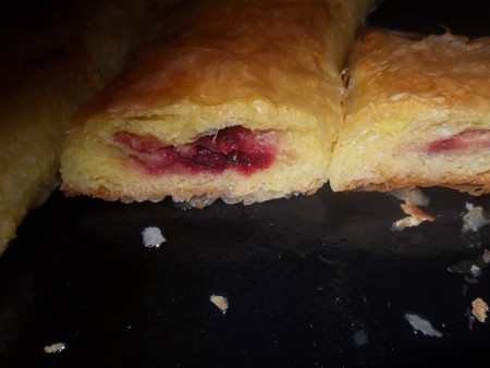 The cut rolled cherry pie.