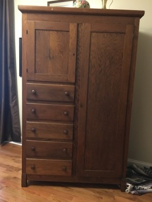 A wooden chifforobe.