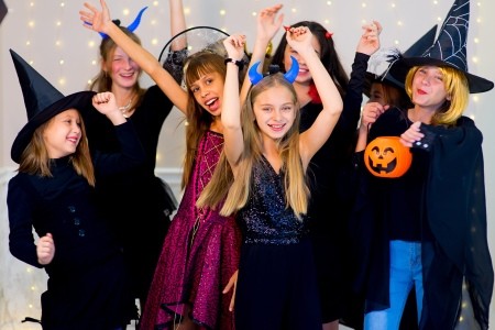 A group of teenagers at a Halloween party.