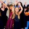 A group of teenagers at a Halloween party.