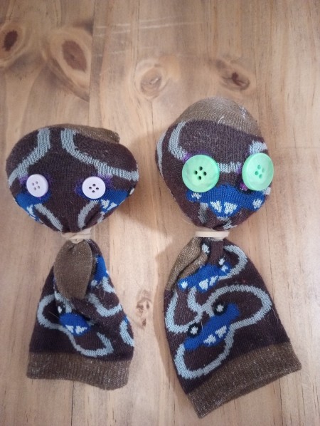 The socks with button eyes.
