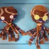 Two socks made into octopus dolls.